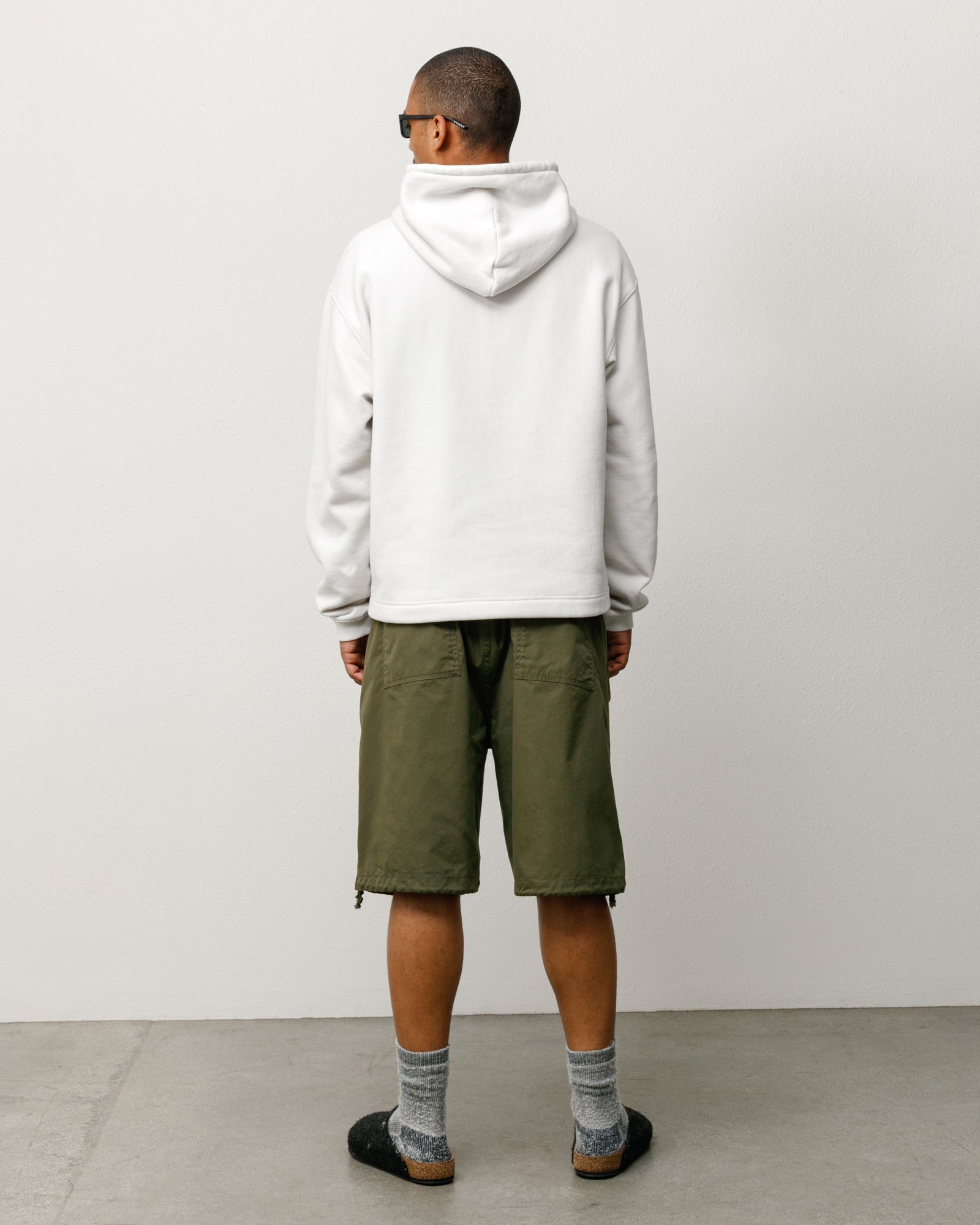 SURPLUS SHORT